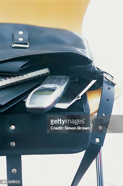 open shoulder bag on a chair - open shoulder stock pictures, royalty-free photos & images