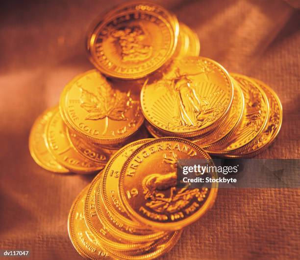 gold coins - australian money stack stock pictures, royalty-free photos & images