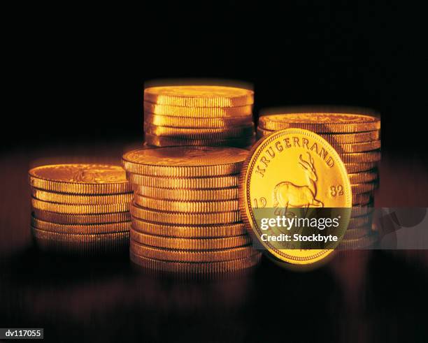 gold coins - gold coin stock-fotos und bilder