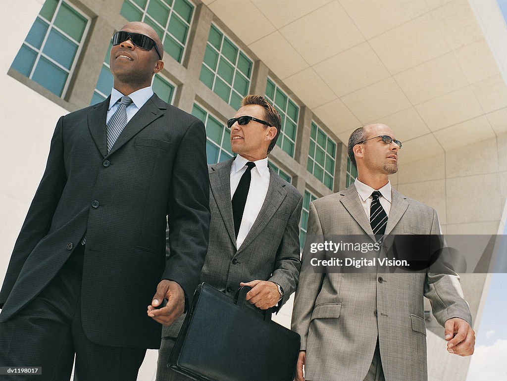 Stylish Confident Businessmen Wearing Suits