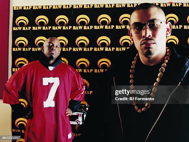 portrait of two male rappers standing in front of a backdrop - lyte honors remy ma wale during 5th year anniversary celebration of hip hop sisters foundation stockfoto's en -beelden