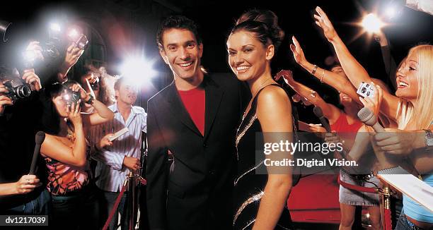 Actor Fan Following 664 Portrait Of An Actor And Actress And A Group Of Fans Stock Photos ...