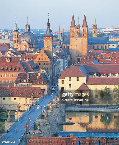 river main and the neumunsterkirche, wurzberg, bavaria, germany - main 個照片及圖片檔