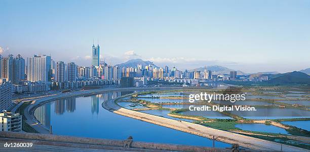 reservoirs and shenzhen city skyline, guangdong province, china - son la province fotografías e imágenes de stock