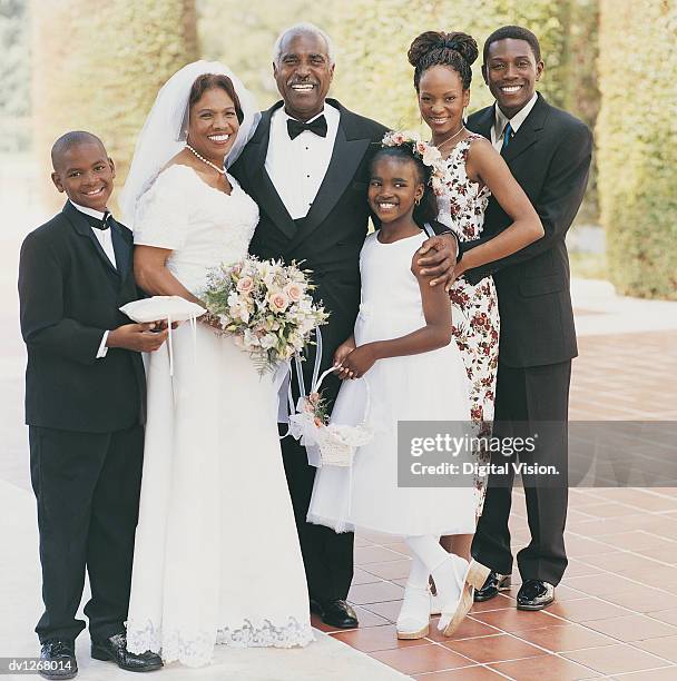 portrait of senior newlyweds with their family - black veil brides stock pictures, royalty-free photos & images