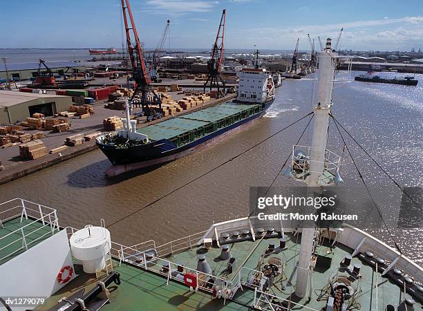 cargo ships in the harbour of immingham port on the river humber, humberside, uk - immingham stock pictures, royalty-free photos & images