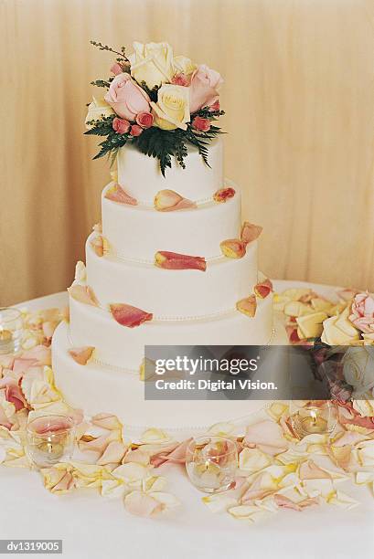 wedding cake on a table - burning rose bildbanksfoton och bilder