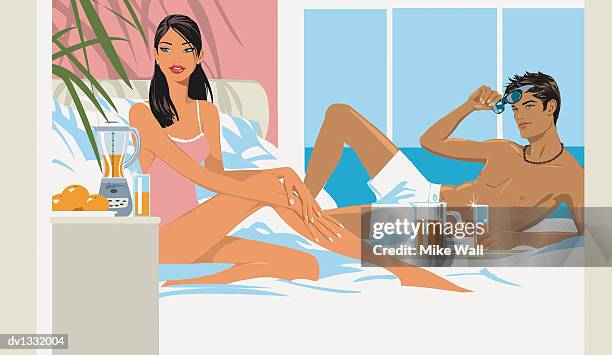 relaxed couple lying and sitting on a bed with glasses and a jug of orange juice - mike 幅插畫檔、美工圖案、卡通及圖標