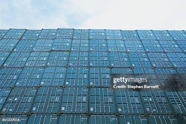 stack of cargo containers - stackable foto e immagini stock