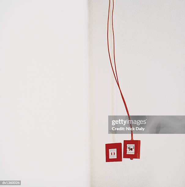 two red fire alarms on a white wall - isolated colour stock pictures, royalty-free photos & images