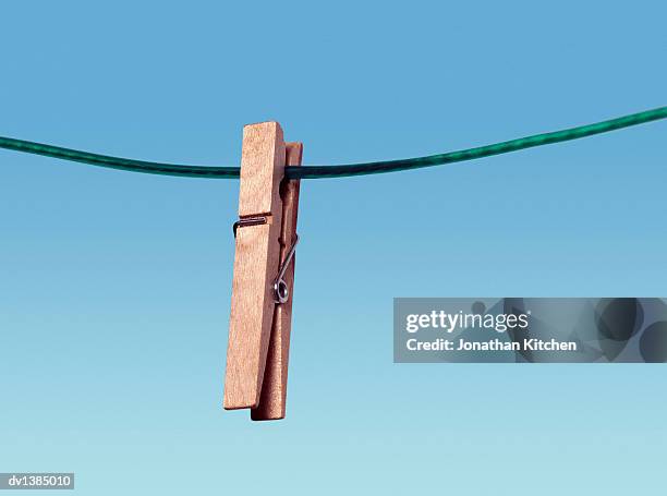 clothes peg upside down on washing line - peg stock pictures, royalty-free photos & images