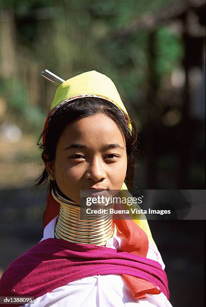 smiling padaung girl wearing traditional clothing - hill tribes stock pictures, royalty-free photos & images