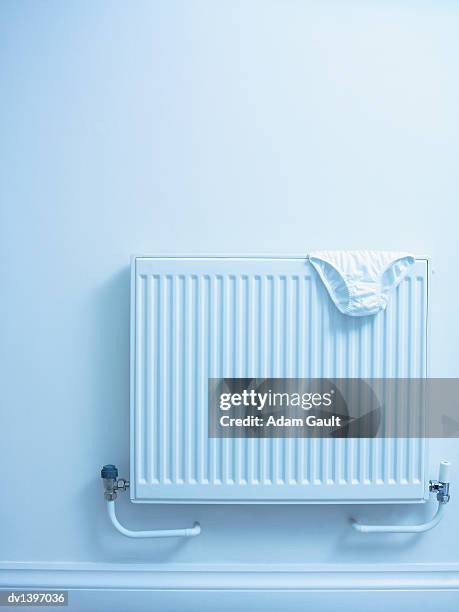 pair of white knickers on radiator - knickers photos - fotografias e filmes do acervo