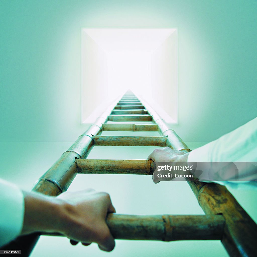 Person Climbing a Ladder to a Bright Skylight