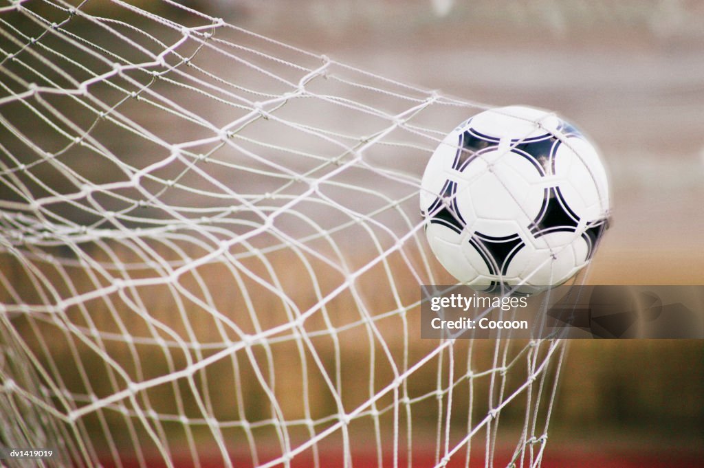 Football Trapped in a Goal Net, Close-Up