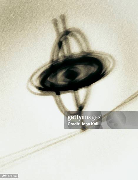 gyroscope on string - gyroscope stock pictures, royalty-free photos & images