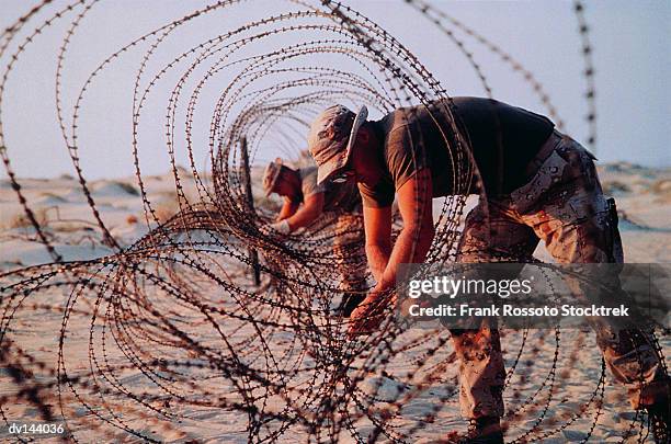 Desert Razor Wire 2,269 Razor Barbed Wire Stock Photos, High-Res Pictures, and Images ...