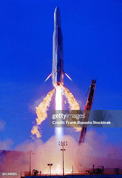 atlas-f rocket blasting off - belasting stock pictures, royalty-free photos & images