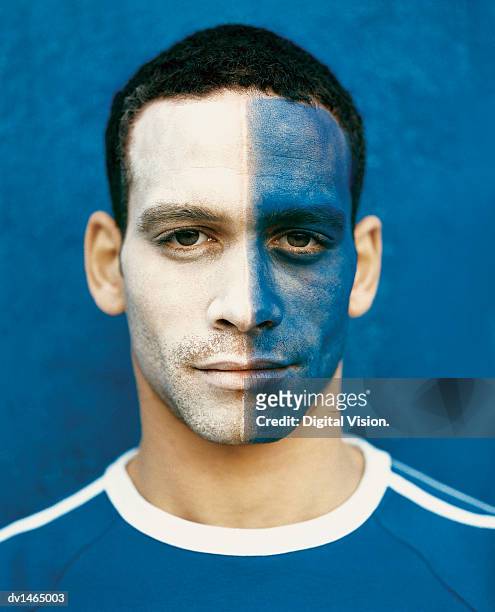 football supporter with a painted face - body paint stock pictures, royalty-free photos & images