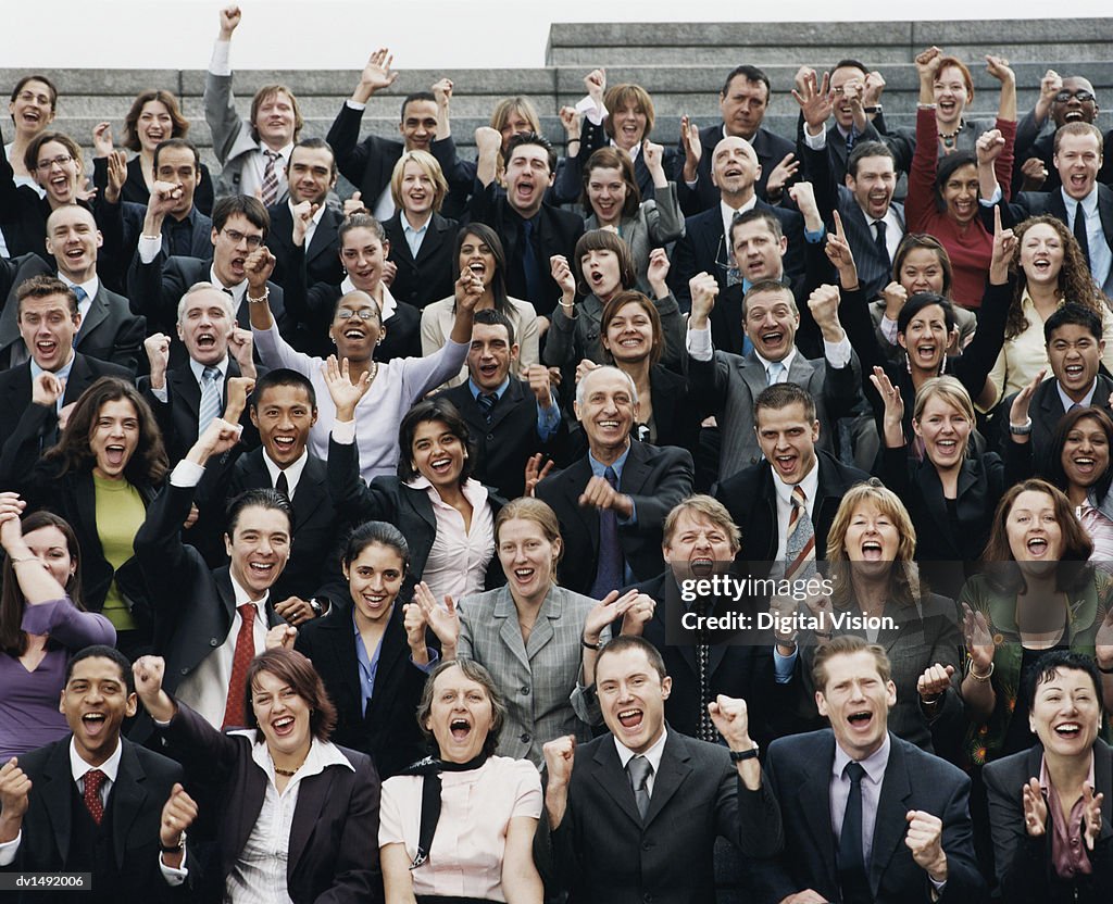 Large Group Large Group Of Business People Sitting Outdoors And Cheering Stock-Foto ...