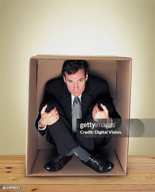 Person Trapped In Box 345 Man Trapped In A Box Stock Photos, High-Res Pictures, and Images ...