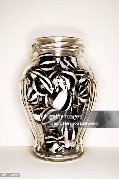 old-fashioned jar of boiled sweets - candy jar stock pictures, royalty-free photos & images