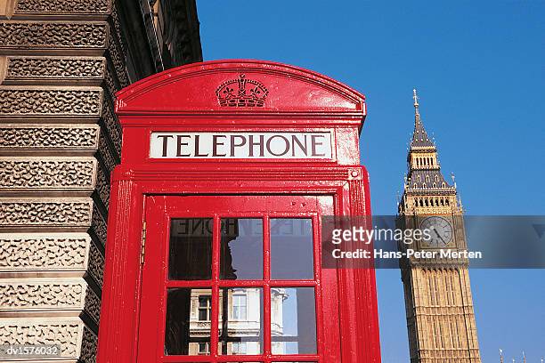 telephone kiosk with big ben in the background, westminster, london, england, united kingdom - vigils are held for the victims of the london bridge terror attacks stockfoto's en -beelden