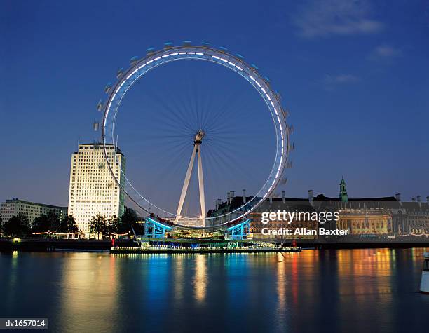 millennium wheel and county hall in the twilight, london, england, united kingdom - vigils are held for the victims of the london bridge terror attacks stockfoto's en -beelden