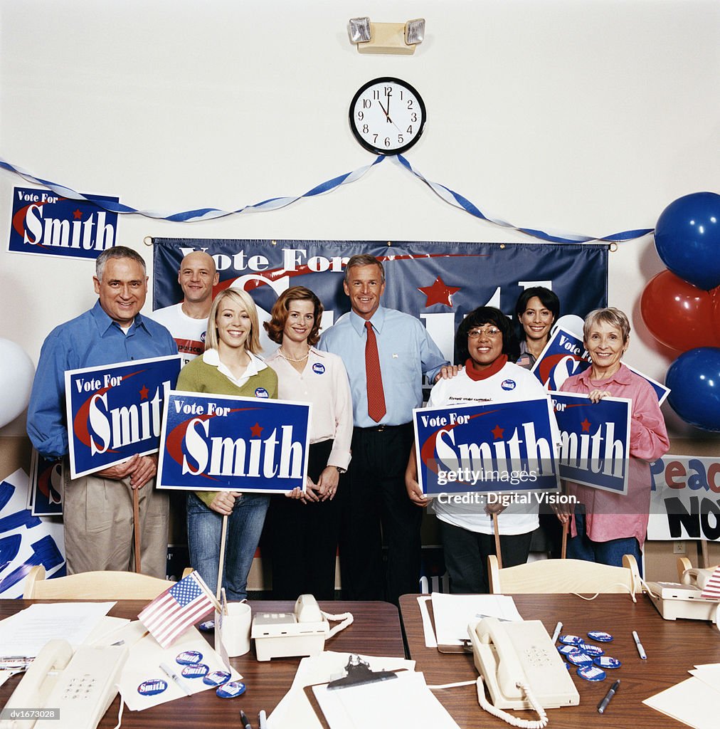 Group Portrait of a Politician With Colleagues in an Office During an Election Campaign