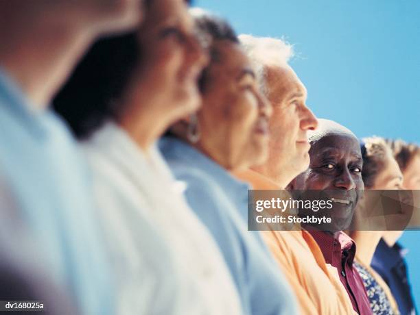 older men and women in lineup - lineup stock pictures, royalty-free photos & images