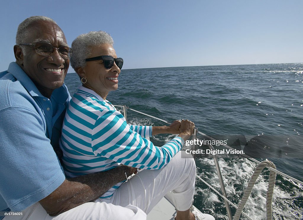 Senior Couple Sat Together on a Yacht