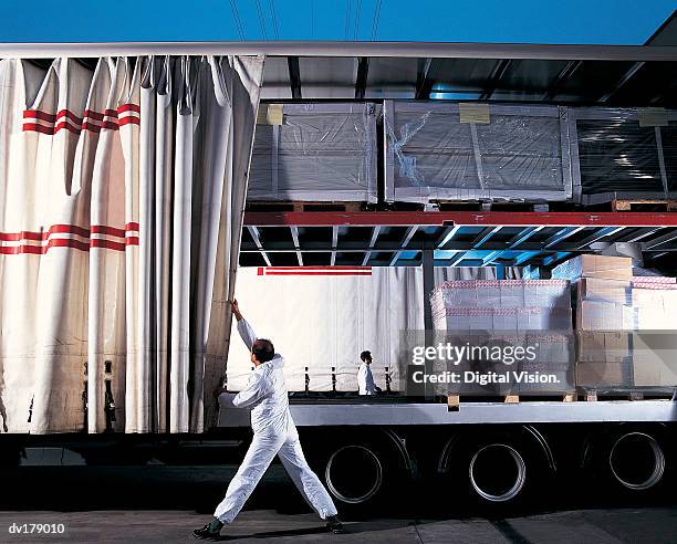 truck with goods on board - dump truck stock-fotos und bilder