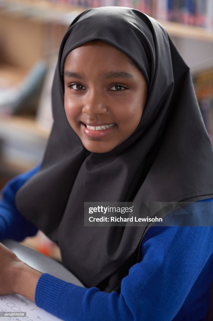 Portrait of a Female Primary School Student in a Hijab