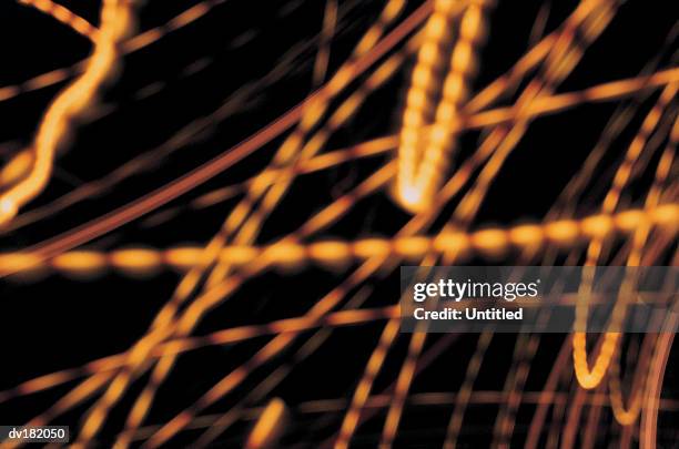 strings of beaded light on a black background - the cinema society with dkny jeans deleon tequila host a screening of no strings attached inside arrivals stockfoto's en -beelden
