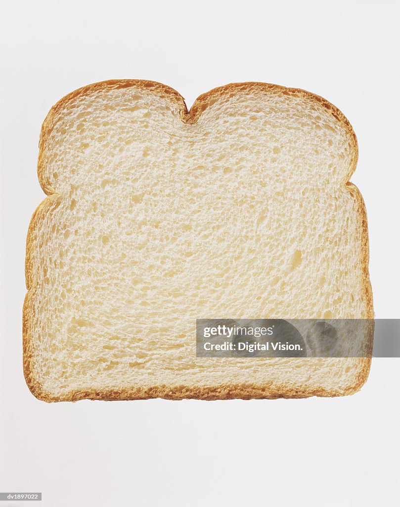 Studio Shot of a Slice of White Bread Against a White Background