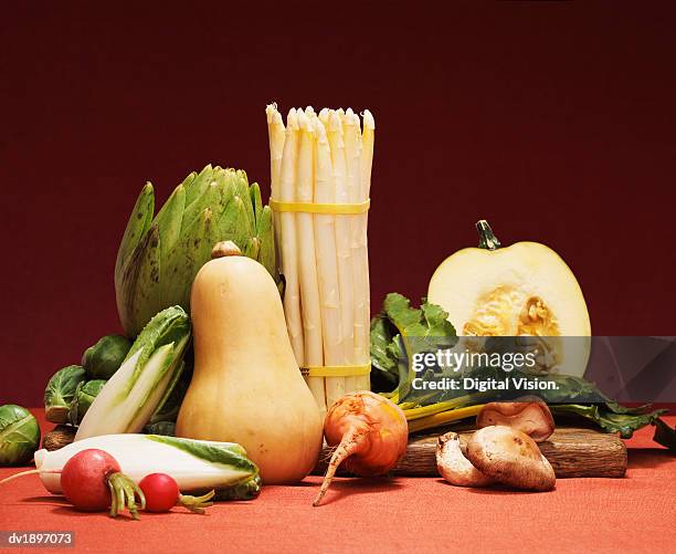 studio shot of a variety of vegetables - variety stockfoto's en -beelden