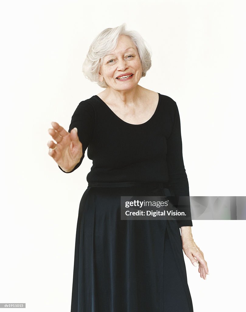 Portrait of a Smiling Senior Woman Wearing a Black Dress