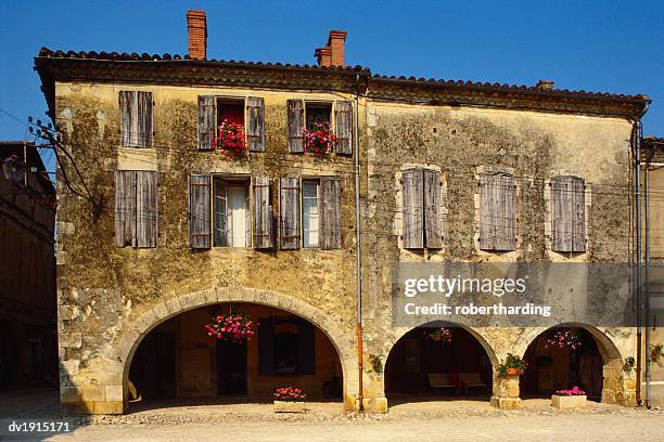 medieval stone house, la bastide d'armagnac, landes, aquitaine, france - garden feature stock pictures, royalty-free photos & images