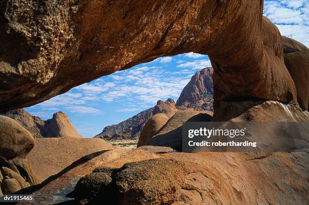natural arch at spitzkoppe, namibia, africa - spitzkoppe stock pictures, royalty-free photos & images