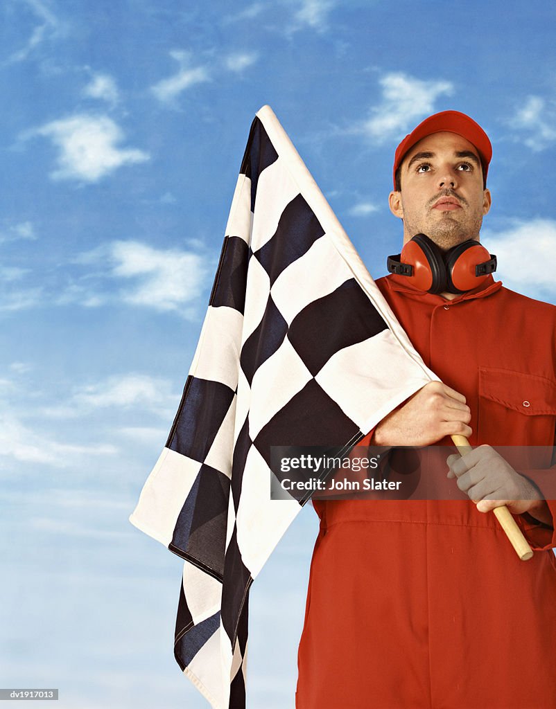 Sports Official Holding a Checkered Flag