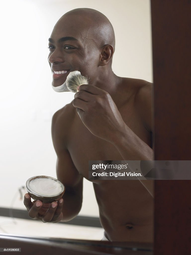 Smiling Man Applying Shaving Foam on His Face