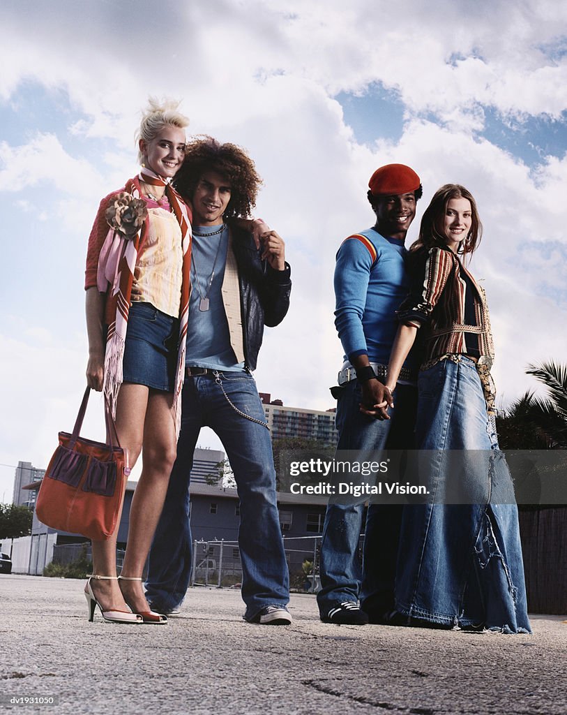 Funky Twentysomething Couples Standing on an Urban Street