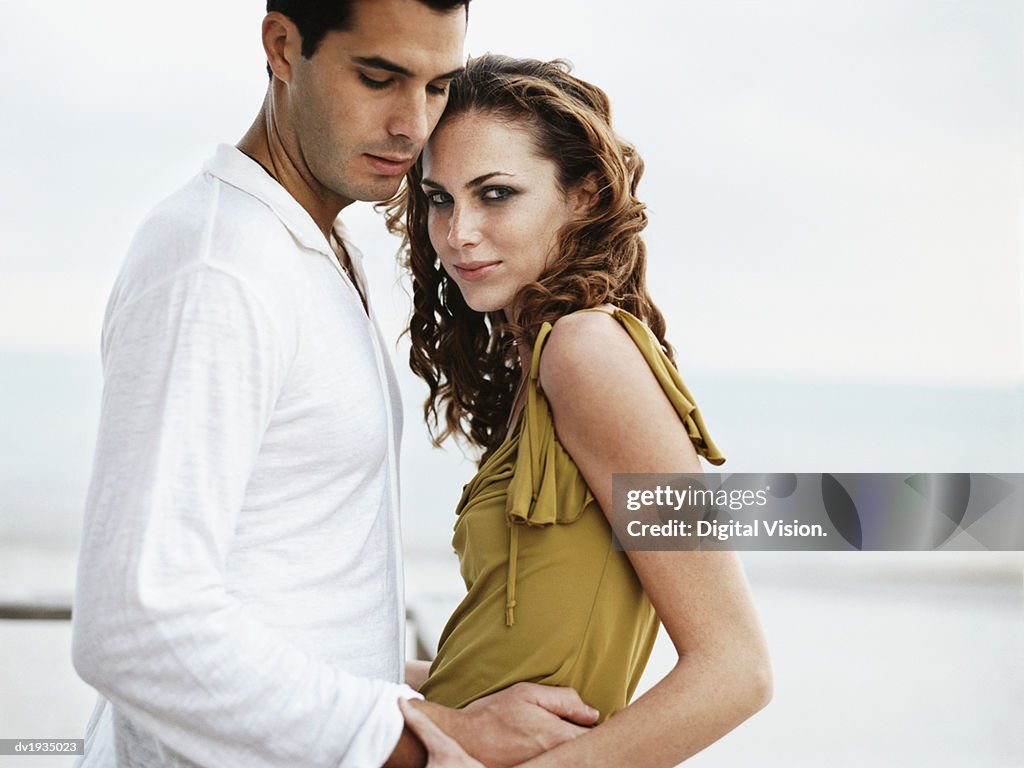 Romantic Couple Standing Together, Woman Looking at Camera