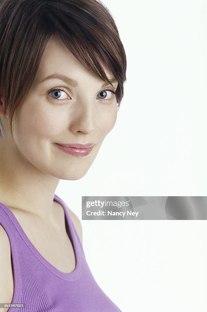 Portrait of a Woman Wearing a Purple Vest