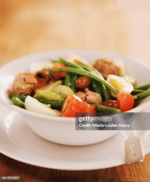 tuna nicoise salad in a bowl - seafood salad stock pictures, royalty-free photos & images