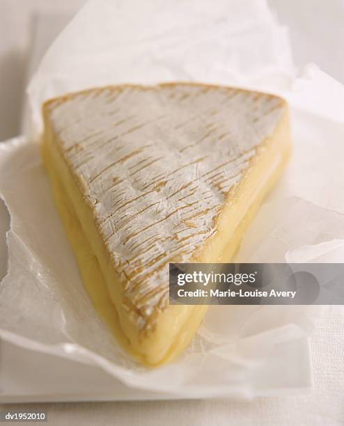 slice of brie - mairie stock pictures, royalty-free photos & images