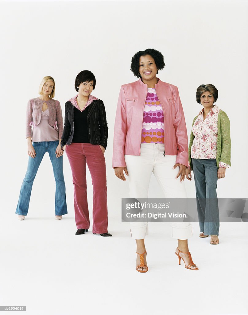 Studio Shot of a Mixed Age, Multiethnic Group of Women, Young Woman at the Front