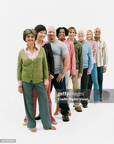 studio shot of a mixed age, multiethnic group of men and women standing in a line - pessoas em fila imagens e fotografias de stock