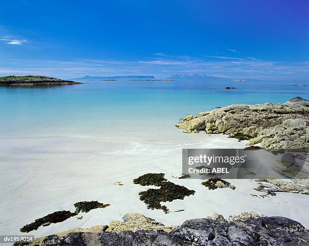 isle of eigg and rum from south morar, highlands, scotland - highland islands stock pictures, royalty-free photos & images