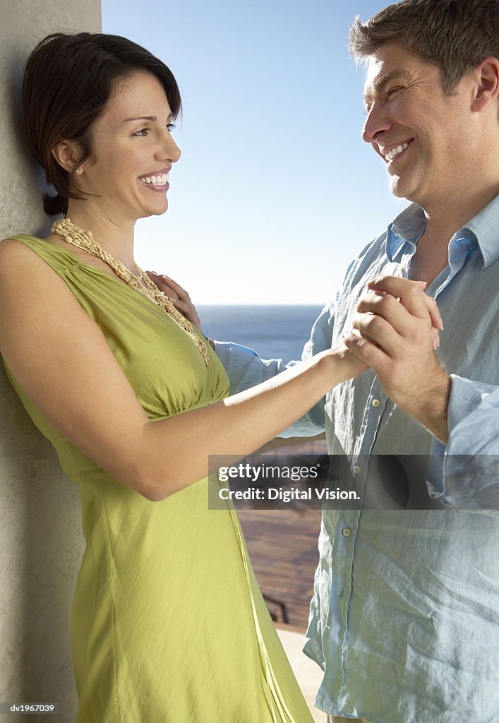 Mature Couple Stand Face to Face Outdoors, Holding Hands